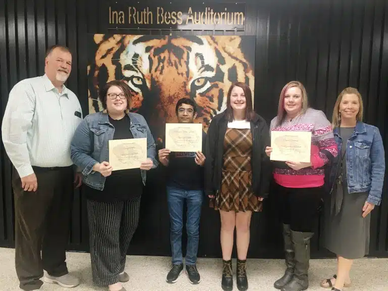 DeKalb County High School Thursday recognized its staff member, student, and parent of the month for February. Pictured left to right: DCHS Principal Bruce Curtis; Staff Member of the Month Becky Miller-Graduation Coach; Student of the Month Freshman Niravsinh “Nera” Dabhi, originally from India; 11th grader and essay winner Alissa Summers with her mother and Parent of the Month Crystal Summers; and Assistant DCHS Principal Jenny Norris.