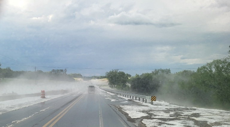 For a brief time Thursday evening, a hailstorm descended on the Liberty and Alexandria areas making the communities look more like a winter day in January than a spring May Day.