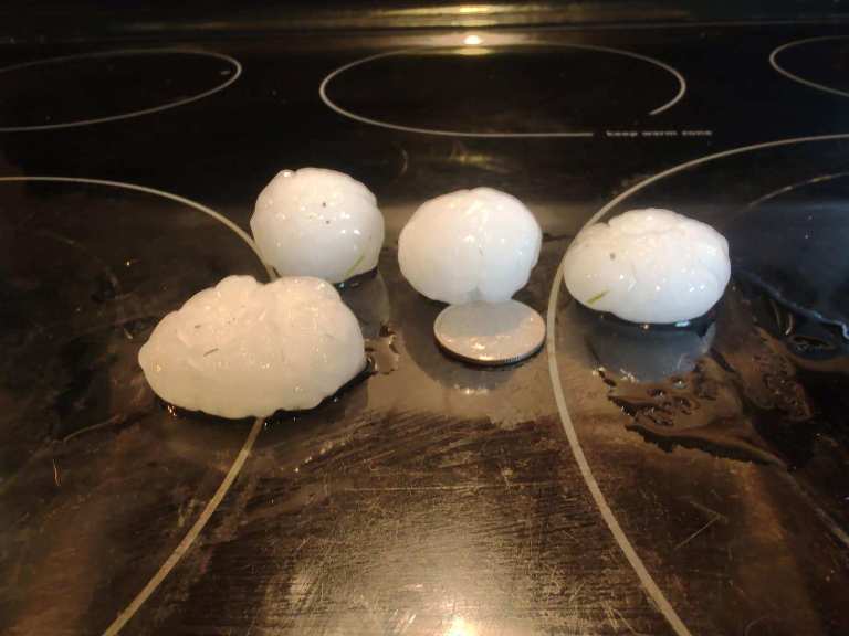 Reports of quarter to golf ball sized hail left roads in the Liberty and Alexandria area Thursday evening covered with ice and slippery. Apparently no injuries were reported