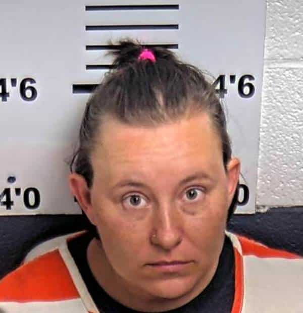 Alexandria Mayor Beth Tripp and the town’s water and sewer manager Richard Edward Potter turned themselves in at the DeKalb County Sheriff’s Department Tuesday afternoon after being named in a criminal summons for trying to get the police chief to cancel a ticket on someone.