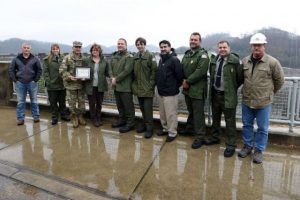 Col. Paul Kremer, U.S. Army Corps of Engineers Great Lakes and Ohio River Division acting commander, presents the division’s water safety team award for 2017 to (left to right) Jody Craig, Center Hill Dam superintendent; park ranger Sarah Peace; Teresa Upchurch, administrative assistant, Center Hill Lake Resource manager’s office; Center Hill Lake park rangers John Malone and Tyler Ferrell, Kevin Salvilla, Center Hill Lake natural resource manager; park rangers Terry Martin and Gary Bruce; Tony Crow, Center Hill Lake facility manager. The award was presented on behalf of Operations Division Chief, William R. Chapman III, which recognized the park rangers at Center Hill Lake conducted eight water rescues during the 2017 recreation season and contacted thousands of people at the lake and local community to promote water safety during a visit to Center Hill Dam Dec. 5, 2017.Photo by Leon Roberts