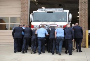 Members of the Smithville Volunteer Fire Department officially placed into service the city’s new fire truck during a brief ceremony historically known as a ‘push back.’