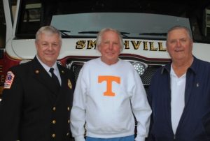 Smithville Fire Chief Charlie Parker with two former city firefighters at Sunday’s 80th anniversary observance, Billy Joe Cripps (center), and Freddy Colvert (right).