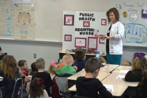 RN Jennifer Buterbaugh with the Rutherford County Health Department talks about her career in nursing with the Kindergartners at DWS.