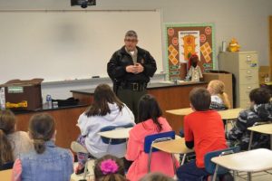 Tennessee Highway Patrolman Lt. Jimmy Neal speaks with students about his career in law enforcement