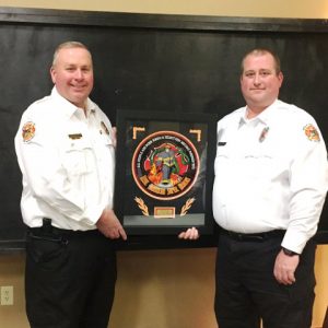 Captain Brian Williams (right) was named the Wilson Bank & Trust DeKalb County Fire Department’s 2017 Officer of the Year. Award presented by Chief Donny Green