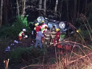 Woman Rescued After Her Vehicle Overturns Down Hillside