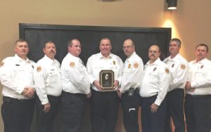 Chief Donny Green was honored by the department’s officers with a “Leadership Award”. Pictured: Lt. Jeremy Neal, Captain Jay Cantrell, Captain Brian Williams, Chief Green, Assistant Chief Anthony Boyd, Captain Michael Lawrence, Lt. Andy Pack, and Lt. Dusty Johnson