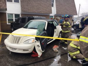 Driverless PT Cruiser runs over Angelia Burke and Knocks down Alecia Burke