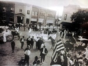 The building can be seen in the background on the public square during a celebration for WWI veterans