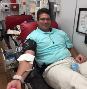 County Clerk James L. (Jimmy) Poss donating blood at previous Blood Assurance Drive