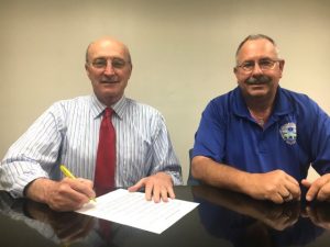 County Mayor Tim Stribling Signs EMS Week Proclamation with EMS Director Hoyte Hale