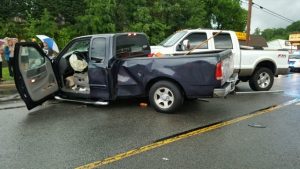 Picture shows 2001 Ford F-150 blue truck, driven by 59 year old Ricky Dowell of Alexandria. Dowell’s wife, 57 year old Shelia Dowell was a passenger with Ricky. Behind it is a 2007 white Ford truck FX4 Off Road,which was driven by a 17 year old boy. Riding with this teen was a 15 year old girl (Jim Beshearse Photo)