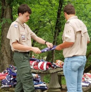 Members of Boy Scout Troop 347 conducted a flag retirement ceremony as part of a Flag Day observance