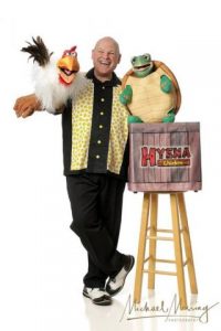 Barry Mitchell with Sam the Tune Turtle and Hyena the Chicken