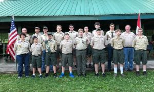 First row left to right are Assistant Scout Master Jen Sherwood, Jaden Wildes, Kaleb Wildes, Zachary Cantrell, Gavin Conger, Arthur Sullivan, Carter Dias, and Brandon Sobotke.Second row left to right are Scout Master Will Sherwood, Assistant Scout Master Doug Stephens, Will Stephens, Thomas Webb, Nate Sherwood, Cody Robinson, Jonathan Birmingham, Friedrich Dodge, and Assistant Scout Master Bill Conger.