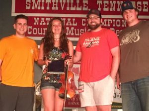 Contest Fiddle for the Neil Dudney Award: First place-Maddie Denton of Murfreesboro. The award was presented to Denton by Dudney's grandsons Ethan, Brandon , and Dylan Shaw.