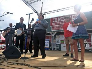 2018 Fiddlers' Jamboree Blue Blaze Award presented to Michael Cleveland. Pictured with his band Flamekeeper, Fiddlers Jamboree Coordinator Sam Stout and Jamboree Marketing Director Shan Burklow