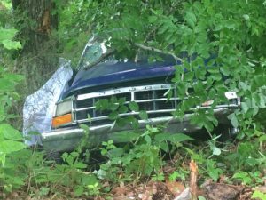 Two people have lost their lives in a pickup truck crash on the Old Mill Hill Road.