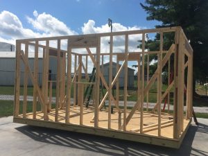 Students in the DCHS Construction Technology (building trades) program also build storage units