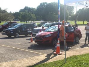 Tiger football fans participating in a test-driving promotion to earn money for DCHS Football from Florence & White Ford last year