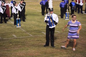 Axel Rico receiving the trophy at Saturday's band contest in Crossville (Bill Conger Photo)