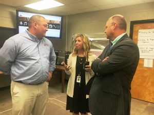 Jenny Norris, Assistant DCHS Principal speaks with Alex Woodward (left) and Chad Colwell of Wilson Bank & Trust during their tour of the Makerspace Thursday at DCHS