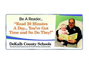 (Older Photo) Joey Reeder reading to his grandchild