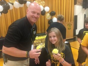 DeKalb West School held an assembly to celebrate and recognize teachers and students for being a 2018 REWARD School. Students were treated to cupcakes and teachers to certificates for their hard work.