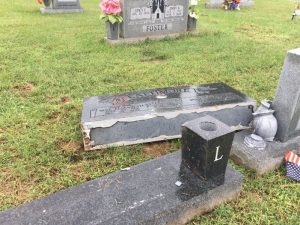 Two Injured and Gravestones Damaged at DeKalb Cemetery in Crash