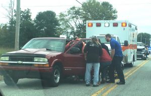 Chevy S-10 driven by 60 year old Kathleen Ellis rear-ended by another truck. Ellis' 12 year old granddaughter was a passenger with her