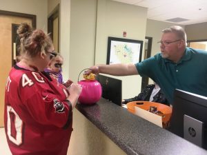 2018 Assessor of Property Shannon Cantrell treats youngster during Halloween at the County Complex