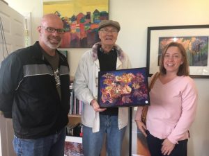 Jack Loeb greets Andy and Carrie Feil at his painting studio on Jacobs Pillar Road Saturday during the Off the Beaten Path Studio Tour.