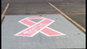 DeKalb Middle School has designated a special parking spot in a show of support for Guidance Counselor Martha Melching, who is seven months pregnant and recently diagnosed with breast cancer.