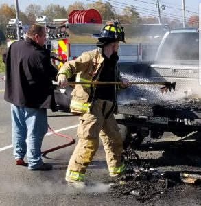 Firewood Rekindles in Back of Pickup Truck (Jim Beshearse Photo)