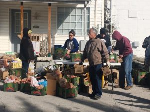 Volunteers preparing food boxes for mobile food pantry