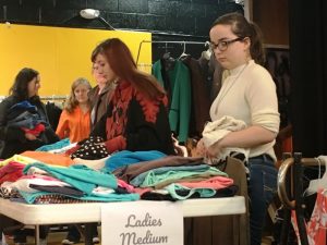 Students making their selections of clothes during Tiger Boutique