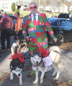 Charlie Robinson, a colorful character, with his dogs in the Liberty Christmas Parade