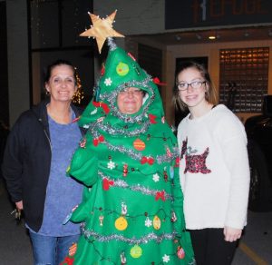 Christmas on the Square: A Living Christmas Tree and friends welcomed visitors to enjoy hot chocolate and free Christmas photos at the Refuge Church downtown
