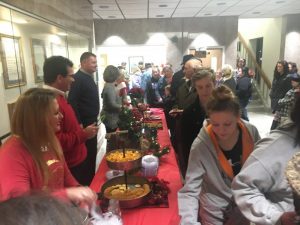 County Officials serving refreshments during Open House at the Courthouse in conjunction with Christmas on the Square in 2018