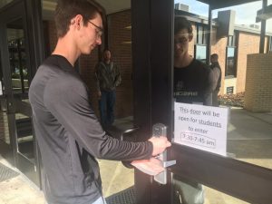DCHS student uses key fob to enter school building