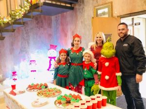 Smithville Mayor Josh Miller and family at city hall during Christmas on the Square