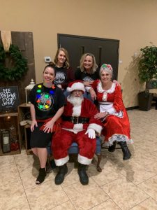 Santa with Norene Puckett, Katie Parker, Rhonda Harpole, and Lisa Cripps at Recovery Court Christmas Party and Graduation