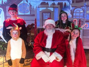 Santa and Friends on the Northpole Stage during Monday Night's Festival of Trees