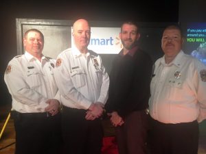 Lieutenant Dusty Johnson(left) and Captain Jay Cantrell (right) presented Walmart 20 year service Award to Assistant Chief Anthony Boyd. Also pictured Smithville Walmart Manager.