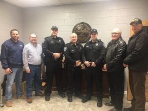 City Attorney Vester Parsley administers oath to the Smithville Police Department’s newest officers. Mayor Josh Miller, Alderman/Police Commissioner Shawn Jacobs, officers Kendall Parker, Eric Ervin, and Colt Stewart, City Attorney Vester Parsley, and Police Chief Mark Collins
