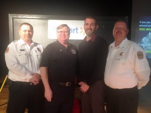 Lieutenant Dusty Johnson(left) and Captain Jay Cantrell (right) presented Walmart 10 year service Award to Steve Repasy, Midway Station. Also pictured Smithville Walmart Manager.