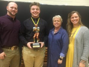 The 2018 DCHS Tiger Football Award Winner: Clay Edwards Memorial Tiger Pride Award presented to Isaac Cross. Pictured here with Sarah Edwards (right) and Abram Edwards (left), daughter and son of the late Clay Edwards and their mother Tena
