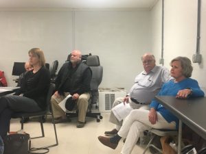 911 Board meeting Tuesday night: Pictured Sabrina Farler (board member) hidden behind her Thurman Seber, Dennis Slager (1st district county commissioner), and Danny and Pat Parkerson.