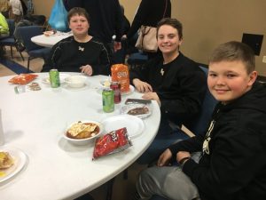 Alex Lemons, Conner Young, and Ty Webb enjoying the DCHS baseball chili supper